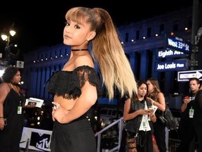 FILE - In this Aug. 28, 2016, file photo, Ariana Grande arrives at the MTV Video Music Awards at Madison Square Garden in New York. (Photo by Chris Pizzello/Invision/AP, File)