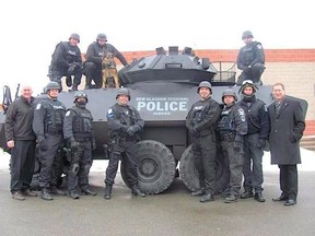 If you&#039;re in the market for a large, tank-like vehicle, the Nova Scotia town of New Glasgow has a deal for you.The town&#039;s police chief says he wants to give away the department&#039;s Cougar light-armoured vehicle, shown in a handout photo, which was a gift from the former local MP, Peter MacKay (bottom right), when he was defence minister. THE CANADIAN PRESS/HO-New Glasgow Police MANDATORY CREDIT