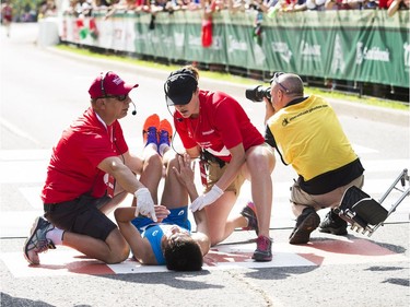 A runner received medical attention at the finish line Sunday May 28, 2017 at the Tamarack Ottawa Race Weekend.