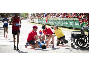 A runner received medical attention at the finish line Sunday May 28, 2017 at the Tamarack Ottawa Race Weekend.