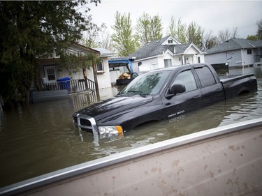 A truck on Rue Adelard where heavy flooding has hit in the Gatineau area Sunday May 7, 2017.