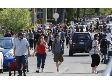 Bargain hunters look for deals at the Great Glebe Garage Sale on Saturday, May 27, 2017.