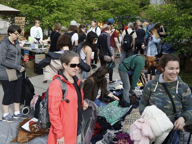 Bargain hunters look for deals at the Great Glebe Garage Sale on Saturday, May 27, 2017.