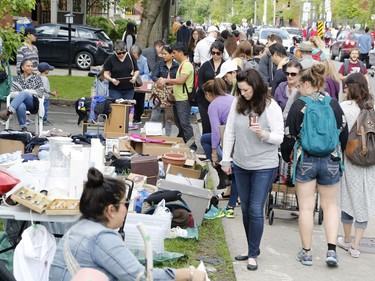 Bargain hunters look for deals at the Great Glebe Garage Sale on Saturday, May 27, 2017.
