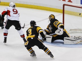 Ottawa Senators' Bobby Ryan (9) scores [ast Pittsburgh Penguins goalie Marc-Andre Fleury (29) after getting by Olli Maatta (3) during the overtime period of Game 1 of the Eastern Conference final in the NHL hockey Stanley Cup playoffs, Saturday, May 13, 2017, in Pittsburgh. Ottawa won 2-1 in overtime.