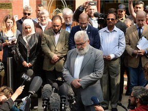 Chair of Trustees at the Manchester Islamic Centre and Didsbury Mosque, Mohammad El Khayat (C), leads a minute's silence in respect of the victims of the May 22 Manchester Arena attack, outside of Didsbury Mosque in Didsbury, Manchester, northwest England, on May 24, 2017. Manchester is showing us how to respond to terror attacks, writes Terry Glavin.