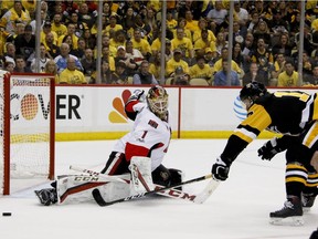 Ottawa Senators goalie Mike Condon makes a save on Pittsburgh Penguins' Bryan Rust during the second period of Game 5 in the NHL hockey Stanley Cup Eastern Conference finals, Sunday, May 21, 2017, in Pittsburgh.