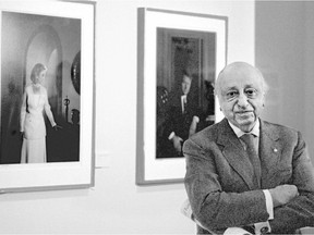 Yousuf Karsh with his portraits of Bill and Hillary Clinton in 1994.