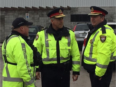 Chief Charles Bordeleau gets an update on the flooding situation in Constance Bay