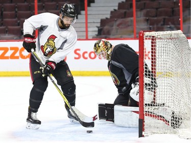 Clarke MacArthur of the Ottawa Senators shoots on Mike Condon during morning practice at Canadian Tire Centre in Ottawa, May 12, 2017.
