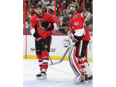 Cody Ceci taps the pads of Craig Anderson after he made a big stop in the second period as the Ottawa Senators take on the Pittsburgh Penguins in Game 3 of the NHL Eastern Conference Finals at the Canadian Tire Centre.  Wayne Cuddington/Postmedia