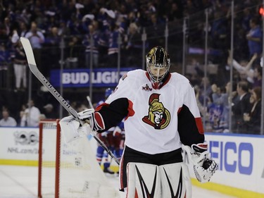 Ottawa Senators goalie Craig Anderson reacts after the New York Rangers' Oscar Lindberg scored during the second period of Game 4.