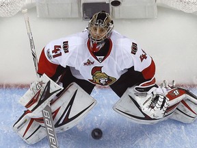 Ottawa Senators goalie Craig Anderson (41) follows an airborne puck during the third period of Game 2 of the Eastern Conference final in the NHL Stanley Cup hockey playoffs against the Pittsburgh Penguins in Pittsburgh, Monday, May 15, 2017. The Penguins won 1-0.
