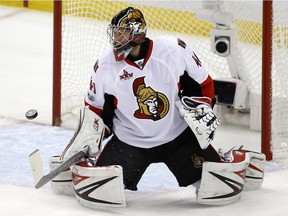 Ottawa Senators goalie Craig Anderson (41) blocks a shot against the Pittsburgh Penguins during the first period of Game 7 of the Eastern Conference final in the NHL Stanley Cup hockey playoffs in Pittsburgh, Thursday, May 25, 2017.