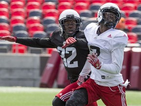 DB Nicholas Taylor (#32) defends against WR Kenny Shaw during Redblacks training camp at TD Place. May 31, 2017.