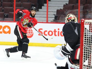 Derick Brassard  of the Ottawa Senators shoots on Mike Condon during morning practice at Canadian Tire Centre in Ottawa, May 12, 2017.