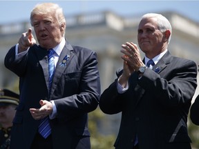 President Donald Trump stands with Vice President Mike Pence during the 36th annual National Peace Officers Memorial Service, Monday, May 15, 2017, on Capitol Hill in Washington. The liberal case against Pence, writes Shannon Gormley, just isn't logical.