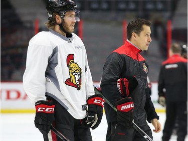 Head Coach Guy Boucher (R) and Mike Hoffman of the Ottawa Senators during morning practice at Canadian Tire Centre in Ottawa, May 12, 2017.