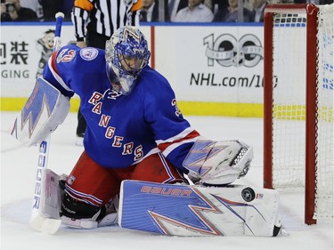 New York Rangers goalie Henrik Lundqvist, of Sweden, stops a shot on the goal during the first period of Game 4 of an NHL hockey Stanley Cup second-round playoff series against the Ottawa Senators Thursday, May 4, 2017, in New York.