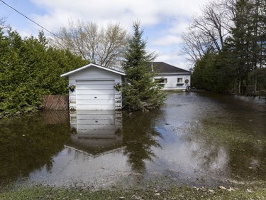 Homes along Bayview Drive in Constance Bay have seen flood waters recede May 15, 2017.