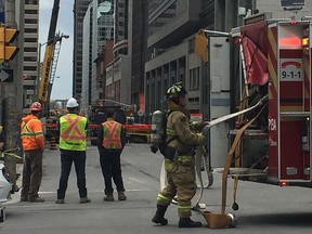 Emergency crews evacuated buildings and closed roads around a natural gas leak at a Queen Street construction site Tuesday afternoon.