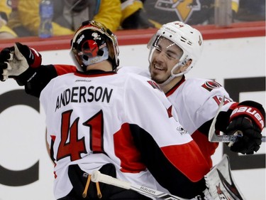 The Ottawa Senators' Jean-Gabriel Pageau celebrates with goalie Craig Anderson after defeating the Pittsburgh Penguins in Game 1 of the Eastern Conference final.
