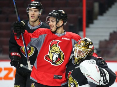 Jean-Gabriel Pageau (L) and Mike Condon (R) of the Ottawa Senators have fun during morning practice at Canadian Tire Centre in Ottawa, May 12, 2017.