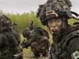 Second-Lieutenant Trevor Clark of The Queen’s Own Rifles of Canada yells orders to his troops while advancing on an enemy position during Exercise MAPLE RESOLVE on May 14, 2017 in Wainwright, Alberta.

Photo by Sgt JF Lauzé Garrison Imaging Petawawa
PA01-2017-0146-054