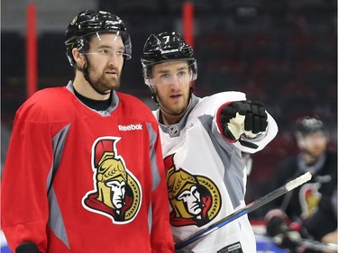 Mark Stone  (L) and Kyle Turris of the Ottawa Senators chat during morning practice at Canadian Tire Centre in Ottawa, May 12, 2017.
