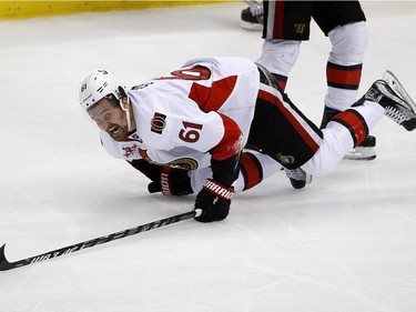 Ottawa Senators right wing Mark Stone (61) reacts after a collision during the third period of Game 7 of the Eastern Conference final against the Pittsburgh Penguins in the NHL Stanley Cup hockey playoffs in Pittsburgh, Thursday, May 25, 2017.