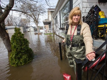 Mary Courneyea at her house on Rue Saint-Patrice in Gatineau which is now unreachable by car. She fears she will lose her home. She just put it up for sale in hopes of retiring to a very small bungalow, but now she fears she has lost everything. As flooding continues throughout the region in areas along the local rivers.