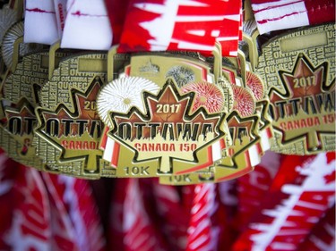 Medals for the 10K race hang near the finish line.