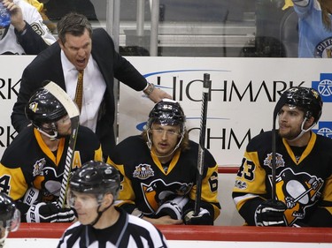 Pittsburgh Penguins head coach Mike Sullivan yells during the third period of Game 7 of the Eastern Conference final against the Ottawa Senators in the NHL Stanley Cup hockey playoffs in Pittsburgh, Thursday, May 25, 2017.