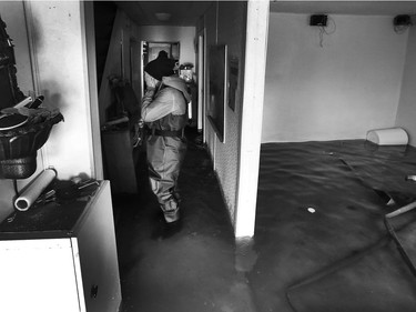 Water is starting to drop around Rue Saint-Louis in Gatineau Tuesday May 9, 2017. Home owners around the Gatineau area can only wait until the water goes away before the clean up can begin. Sylvie Lavoie was upset after seeing her water filled house on Rue Jacques-Cartier in Gatineau Tuesday. The couple were visiting their house trying salvage anything on the destroyed first floor.