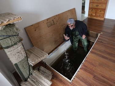 Water is starting to drop around Rue Saint-Louis in Gatineau Tuesday May 9, 2017. Home owners around the Gatineau area can only wait until the water goes away before the clean up can begin. Daniel Doucet has seven feet of water in his basement on Rue St-Francois-Xavier.     Tony Caldwell