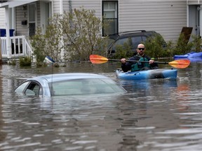 The flooding around Rue Saint-Louis in Gatineau had this man resorting to a different sort of transport last week.