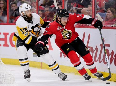Nick Bonino chases Tommy Wingels in the third period.