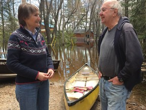 North Algona Wilberforce mayor Deborah Farr discusses flooding with Golden Lake cottager Doug Hildebrandt, who can't reach his cottage because of high water.