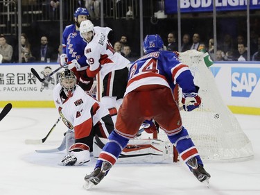 New York Rangers' Oscar Lindberg (24) shoots the puck past Ottawa Senators goalie Craig Anderson (41) for a goal during the second period of Game 3 of an NHL hockey Stanley Cup second-round playoff series Tuesday, May 2, 2017, in New York.