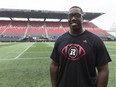 Moton Hopkins stands on the sidelines at TD Place stadium on Monday after announcing his retirement as a CFL player. Errol McGihon/Postmedia