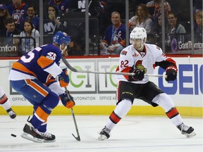 Colin White gets his stick up on the Islanders' Jason Chimera in the Senators regular-season final at Brooklyn on April 9. It was one of two regular-season games played by White, a first-round draft pick in 2015.