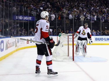 NEW YORK, NY - MAY 04: Cody Ceci #5 and Craig Anderson #41 of the Ottawa Senators regroup following a goal by Oscar Lindberg #24 of the New York Rangers at 15:54 of the second period in Game Four of the Eastern Conference Second Round during the 2017 NHL Stanley Cup Playoffs at Madison Square Garden on May 4, 2017 in New York City.