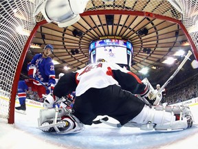 Nick Holden #22 of the New York Rangers scores a first period goal past Craig Anderson #41 of the Ottawa Senators in Game Four of the Eastern Conference Second Round during the 2017 NHL Stanley Cup Playoffs at Madison Square Garden on May 4, 2017 in New York City.