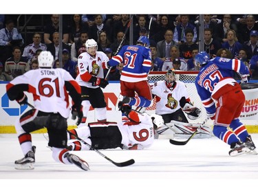 NEW YORK, NY - MAY 09:  Rick Nash #61 of the New York Rangers jumps over Bobby Ryan #9 of the Ottawa Senators during the first period in Game Six of the Eastern Conference Second Round during the 2017 NHL Stanley Cup Playoffs at Madison Square Garden on May 9, 2017 in New York City.