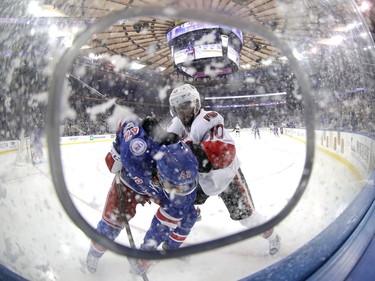 NEW YORK, NY - MAY 09:  Tom Pyatt #10 of the Ottawa Senators checks Brendan Smith #42 of the New York Rangers during the third period in Game Six of the Eastern Conference Second Round during the 2017 NHL Stanley Cup Playoffs at Madison Square Garden on May 9, 2017 in New York City.