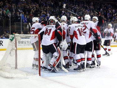 Craig Anderson #41 of the Ottawa Senators celebrates with his teammates after defeating the New York Rangers in Game Six of the Eastern Conference Second Round during the 2017 NHL Stanley Cup Playoffs at Madison Square Garden on May 9, 2017 in New York City. The Ottawa Senators defeated the New York Rangers with a score if 4 to 2.