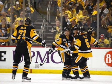 PITTSBURGH, PA - MAY 21:  Sidney Crosby #87 of the Pittsburgh Penguins celebrates with his teammates after scoring a goal against Craig Anderson #41 of the Ottawa Senators during the first period in Game Five of the Eastern Conference Final during the 2017 NHL Stanley Cup Playoffs at PPG PAINTS Arena on May 21, 2017 in Pittsburgh, Pennsylvania.
