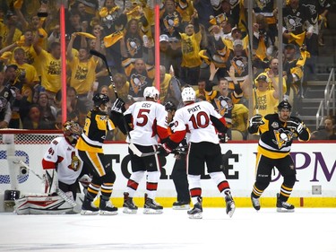 PITTSBURGH, PA - MAY 21:  Sidney Crosby #87 of the Pittsburgh Penguins celebrates with his teammates after scoring a goal against Craig Anderson #41 of the Ottawa Senators during the first period in Game Five of the Eastern Conference Final during the 2017 NHL Stanley Cup Playoffs at PPG PAINTS Arena on May 21, 2017 in Pittsburgh, Pennsylvania.