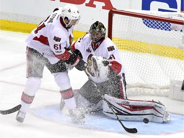 Craig Anderson and Mark Stone team up in the third period.