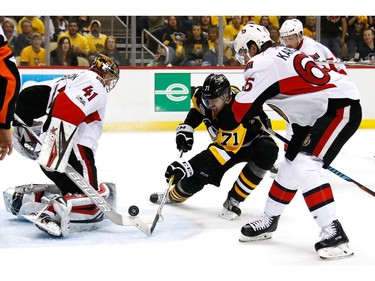 Evgeni Malkin takes a shot against Craig Anderson.